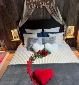 Maisons de vacances La Petite Escapade, maison avec jacuzzi privatif : photos des chambres