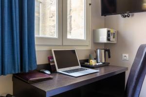 Hotels Hotel Notre Dame : photos des chambres