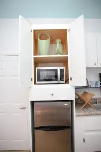 Tangerine Sunsets Castaway by the sea - Behring Point