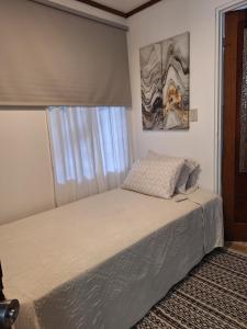 Habitación cama individual a 10 min del Aeropuerto