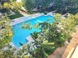 Departamento con piscina, en zona tranquila, a 12 minutos de la playa!