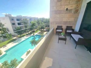 Encantador departamento con vista a la piscina y a 10 minutos de la playa!