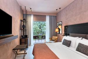 Tropical Retreat, Guest room, 1 King, Mountain view, Balcony room in Domes of Corfu