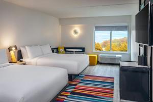 Queen Room with Two Queen Beds room in Magnuson Hotel Framingham
