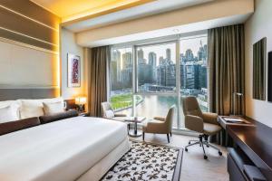  Superior King Room with Canal and Bay View (Complimentary Shuttle to Dubai Mall, Metro & La Mer Beach) room in Grand Millennium Business Bay