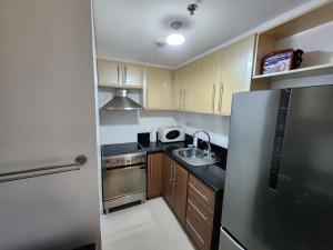 1BR Condo w Balcony near NAIA, Casino, Newport