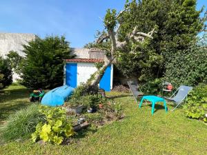 Appartements Au coeur d’un jardin ensoleille : photos des chambres