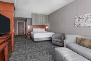 King Room with Sofa Bed room in Courtyard by Marriott Buffalo Airport