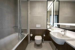King Suite with Sofa Bed room in Courtyard by Marriott Katowice City Center
