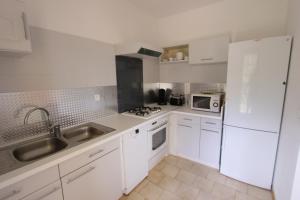 Appartements Residence Capizzolu : photos des chambres