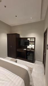 مجمع الملكة بصامطة غرفة فندقية راقيه تلبيي احتياجات الضيوف