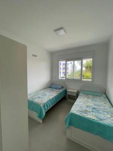 Menos de 200m do mar, garagem e churrasqueira