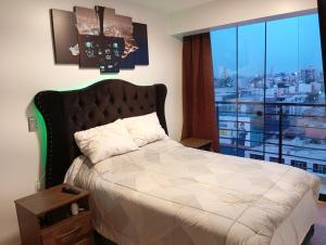 Departamento equipado con aire acondicionado, calefacción, balcón con buena vista