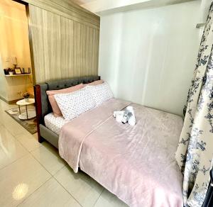 Vanilla Suites Mall of Asia Complex - Stanze in casa privata, Manila
