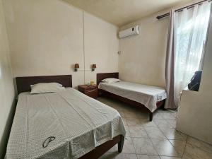 Serene Home in Flic en Flac with Garden & Parking