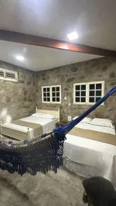 Chalé Encontro das Pedras na Serra - Passa e Fica