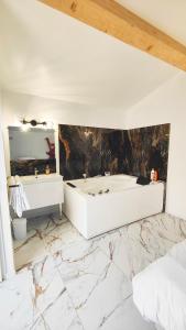 Villas Maisons Plaisir & Pulsion Spa Sauna Prive : photos des chambres