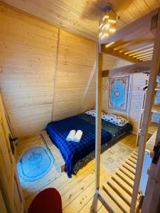 Wooden Huts In Mestia