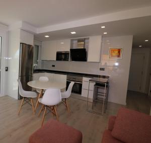 apartamento varias piscinas salida directa a la playa