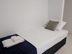 Quarto com Ar-Condicionado em Casa Compartilhada a 5 Min da Praia