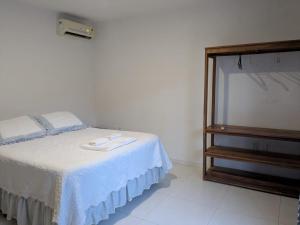 Quarto com Ar-Condicionado em Casa Compartilhada a 5 Min da Praia