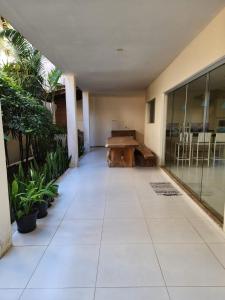 Quarto com Ar-Condicionado em Casa Compartilhada a 5 Min da Praia