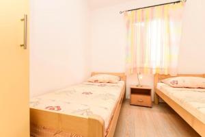 Apartments by the sea Zaboric, Sibenik - 22720