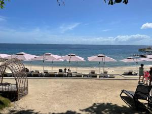 Mactan Newtown condo free pool with private beach access
