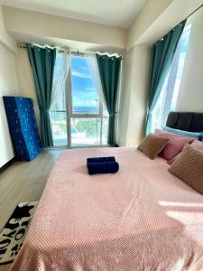 Mactan Newtown condo free pool with private beach access