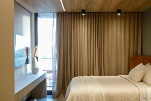 New Time Conforto e Sofisticacao a Beira Mar