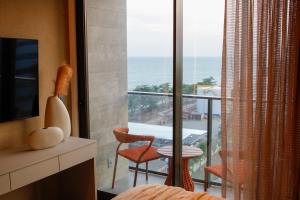 New Time Conforto e Sofisticacao a Beira Mar