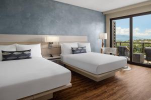 Guest Room with 2 queen bed, ocean view and balcony room in AC Hotel by Marriott Maui Wailea