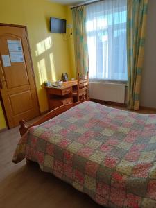 B&B / Chambres d'hotes AU COEUR DE L'ENCLAVE : photos des chambres