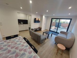 Appartement avec terrasse dans la verdure