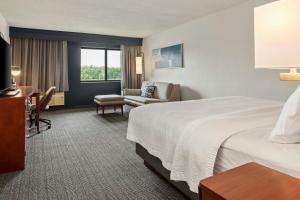 Larger Guest room, 1 King, Sofa bed, River view room in Courtyard La Crosse Downtown/Mississippi Riverfront