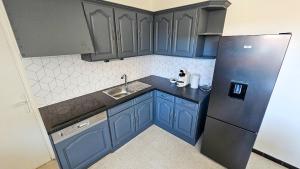 Appartements La Comete 4 Bedroom WiFi TV : photos des chambres