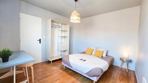 Appartements La Comete 4 Bedroom WiFi TV : photos des chambres
