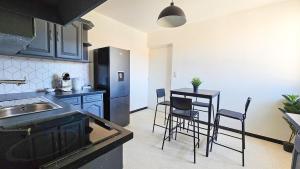 Appartements La Comete 4 Bedroom WiFi TV : photos des chambres