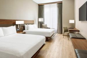 Queen Room with Two Queen Beds - Non-Smoking room in AC Hotel by Marriott San Francisco Airport/Oyster Point Waterfront