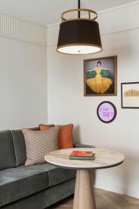 Deluxe Family Room with King Bed and Sofa Bed room in Imperial Riding School Renaissance Vienna Hotel