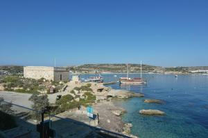 MEL 2 2BED seaview in Ghadira by Homely