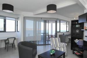 MEL 1 2BED seaview in Ghadira by Homely