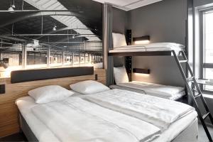 Standard Family Room with King Bed and Bunk Beds room in Zleep Hotel Aalborg