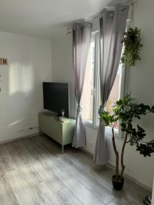 Appartements Chez Brunella Reims centre avec parking : photos des chambres