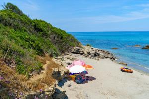 Appartements La Caletta Corsa Apartments con due camere a 100 m dal mare - WiFi fibra FTTH - ALL INCLUSIVE : photos des chambres