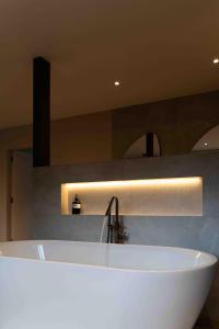 La Suite Pachy - Escapade de luxe avec sauna privé