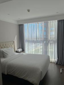 Luxury Apartment - Rooftop Swimming Pool - Beach Front - Hinata Apartment