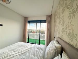 Appartement luxueux 2 Chambres avec salle de sport et parking