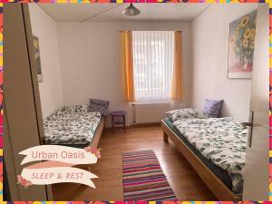 Urban Oasis Basel - Cozy, Eco-friendly and Modern Apartment with Terrace & Garden