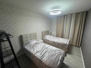 Appartements Appartement neuve avec jacuzzi : photos des chambres